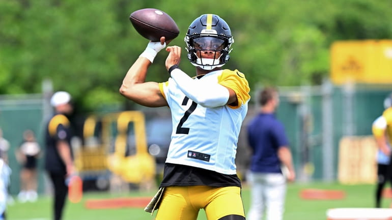 Pittsburgh Steelers quarterback Justin Fields throws a pass during the...