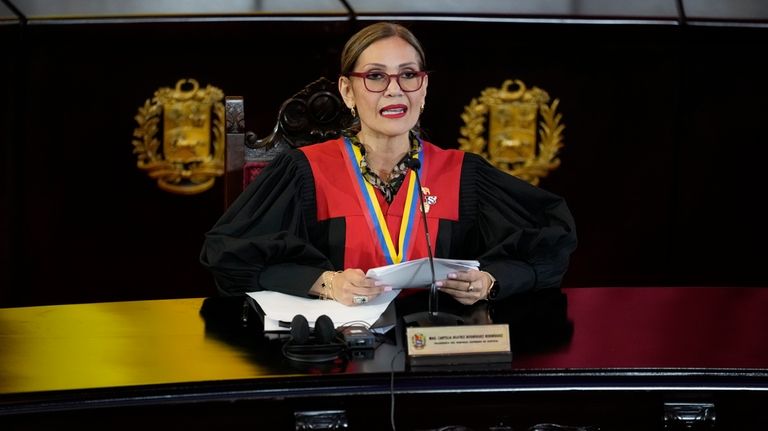 Supreme Court President Caryslia Rodriguez speaks at the Court which...