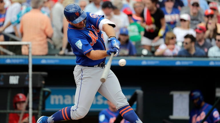 Mets first baseman Pete Alonso singles during the first inning...