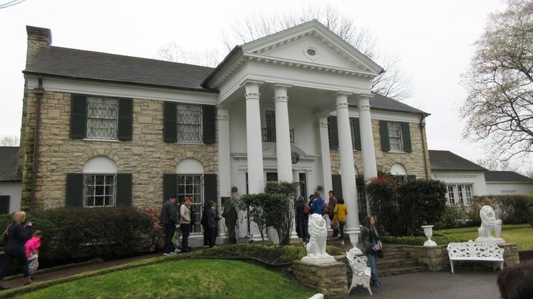 Visitors prepare to tour Graceland in Memphis, Tenn., in 2017.