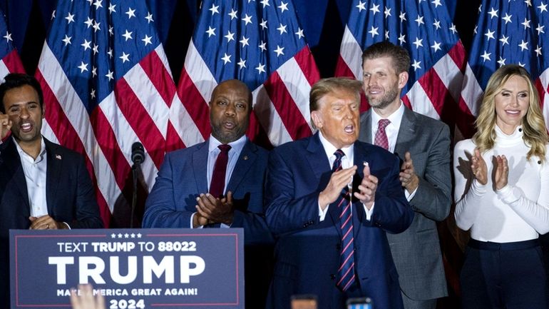 Donald Trump on stage at a primary night party in...