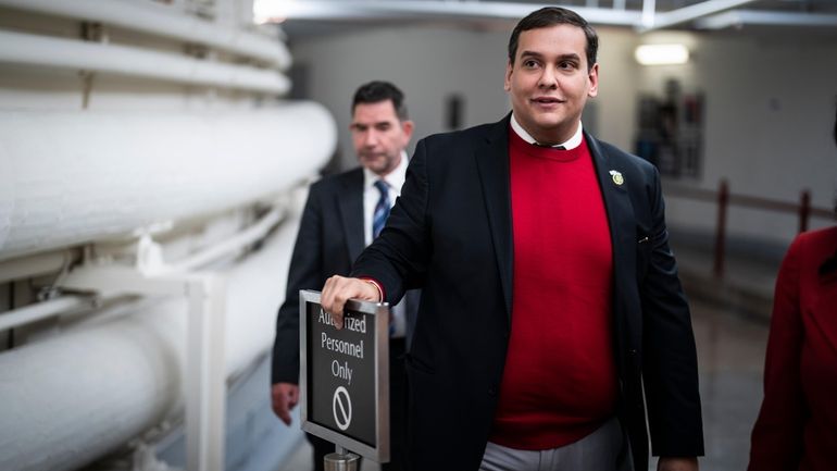 Rep. George Santos (R-Nassau/Queens) walks back to his office after...