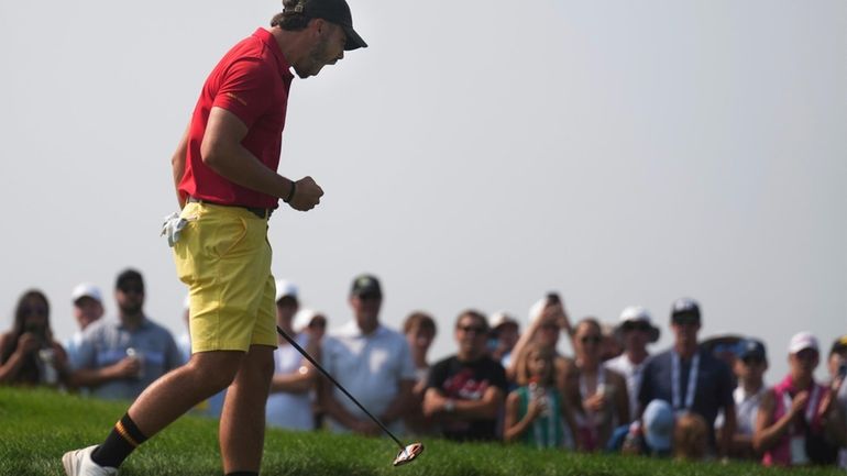 Jose Luis Ballester reacts after his shot for the 15th...