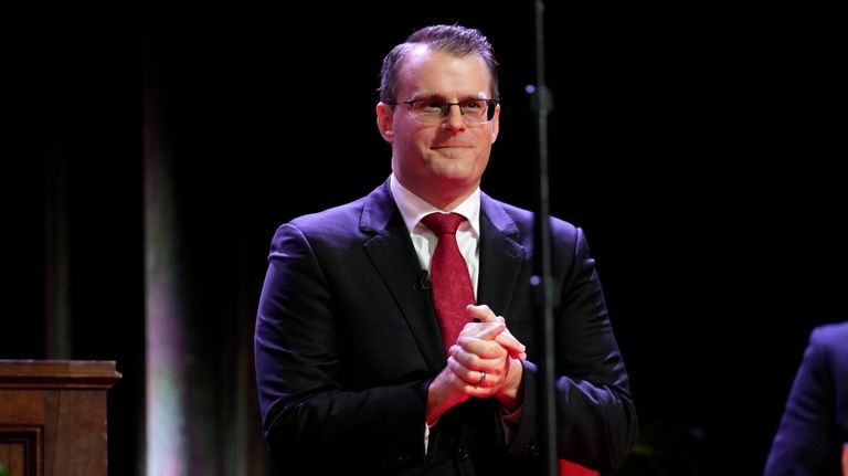 Iowa Lt. Gov. Adam Gregg smiles after delivering his inaugural...