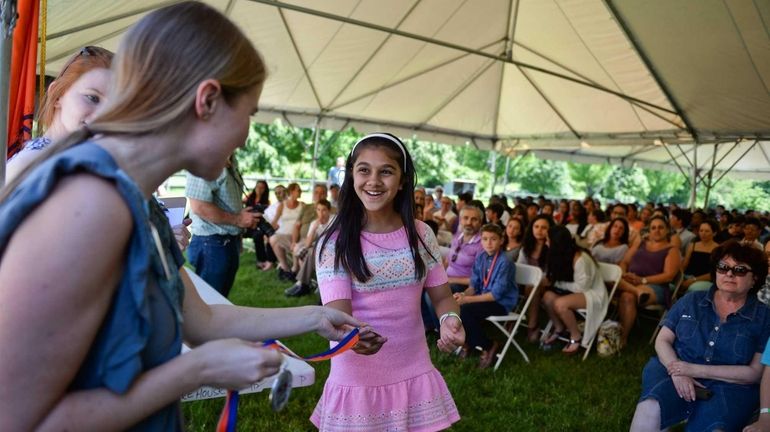 Smiti Shah, an eighth-grader at JFK Middle School in Bethpage,...