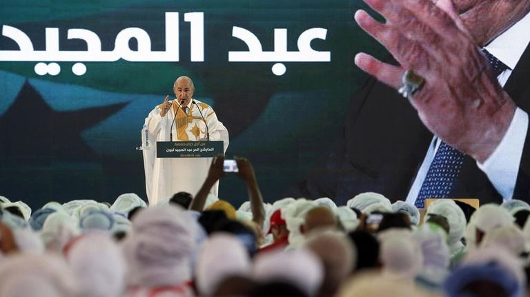 Algerian president and candidate for re-election Abdelmajid Tebboune delivers a...