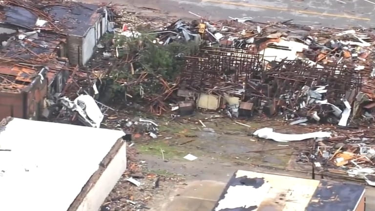 This image taken from video provided by KOCO shows buildings...