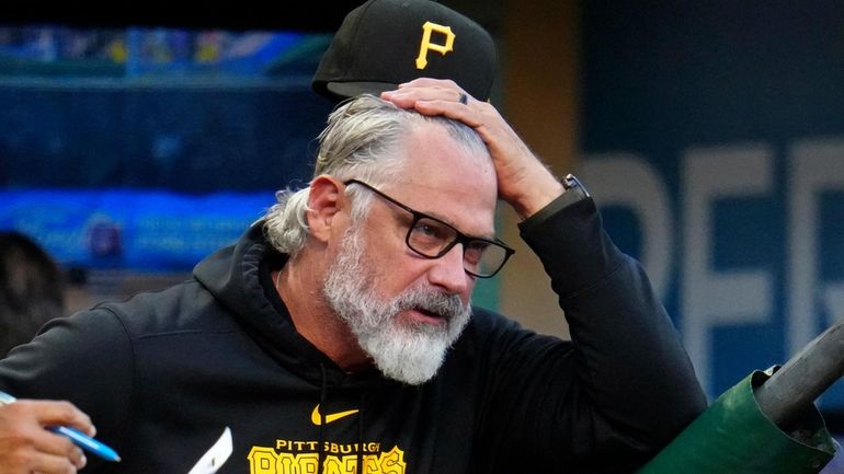 Pittsburgh Pirates manager Derek Shelton reacts in the dugout during...