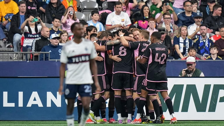 Inter Miami's Leonardo Campana (8) celebrates with teammates after scoring,...
