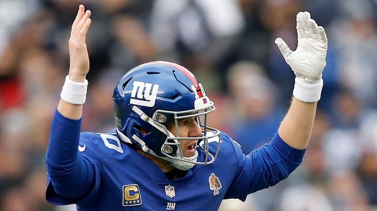 New York Giants QB Eli Manning (10) drops back to pass against the  Indianapolis Colts at Meadowlands Stadium in New Jersey on September 10,  2006. It is the first time in NFL