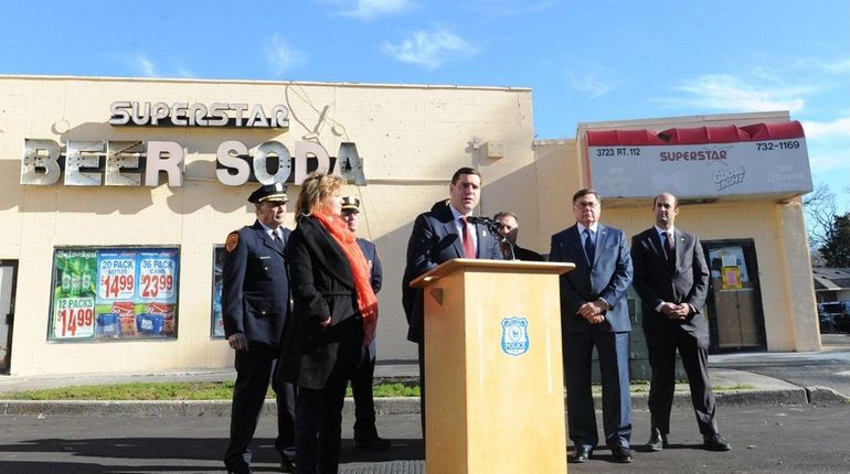 Suffolk County police Commissioner Timothy Sini in front of Superstar...