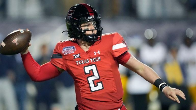 Texas Tech quarterback Behren Morton (2) passes against California during...