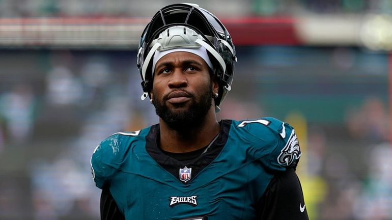 Then-Philadelphia Eagles' Haason Reddick walks off the field at halftime...