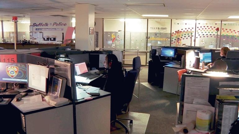 The 911 operations center at police headquarters in Yaphank in...