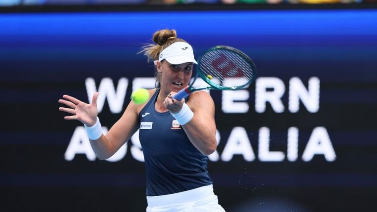 Beatriz Haddad Maia of Brazil hits a forehand shot to...