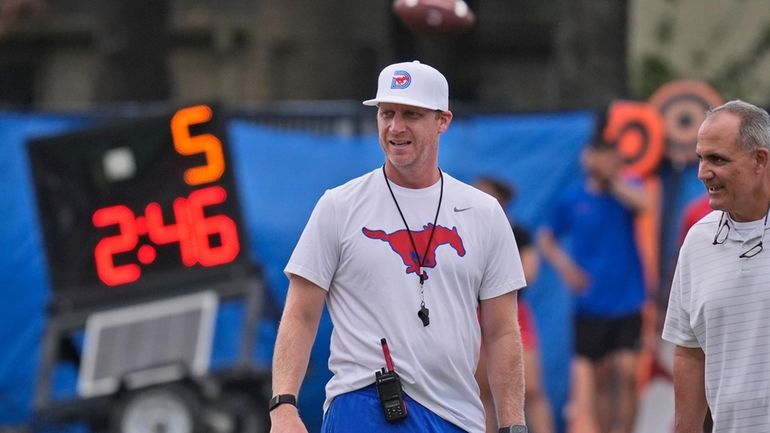 SMU head football coach Rhett Lashlee watches an NCAA college...