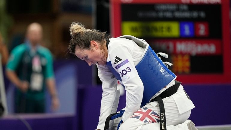 Britain's Jade Jones reacts as she competes with North Macedonia's...