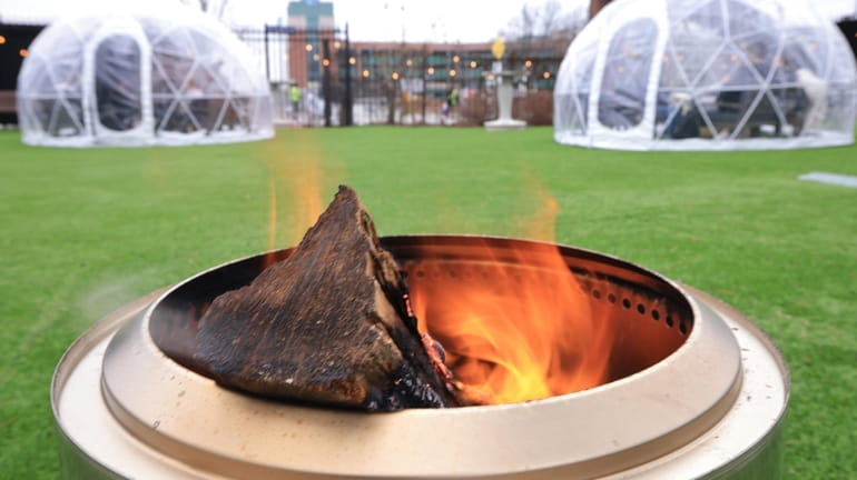 Fire pits and VIP igloos were featured at UBS Arena...