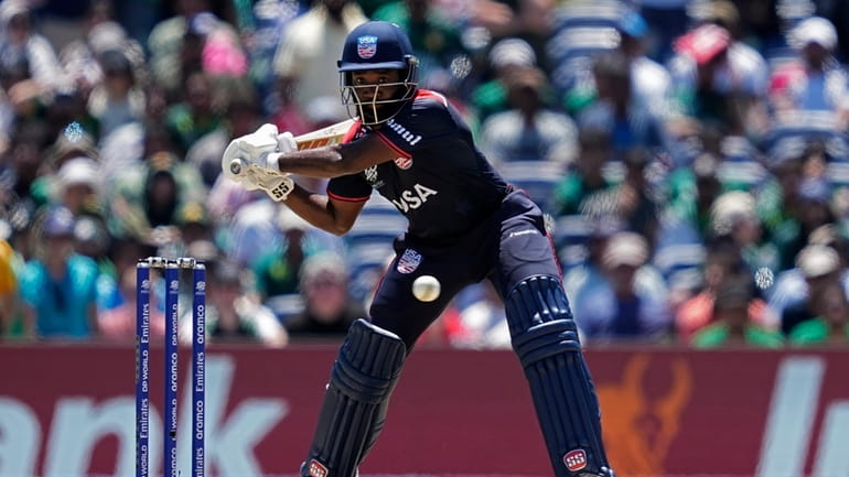 United States' Aaron Jones plays a shot in super over...