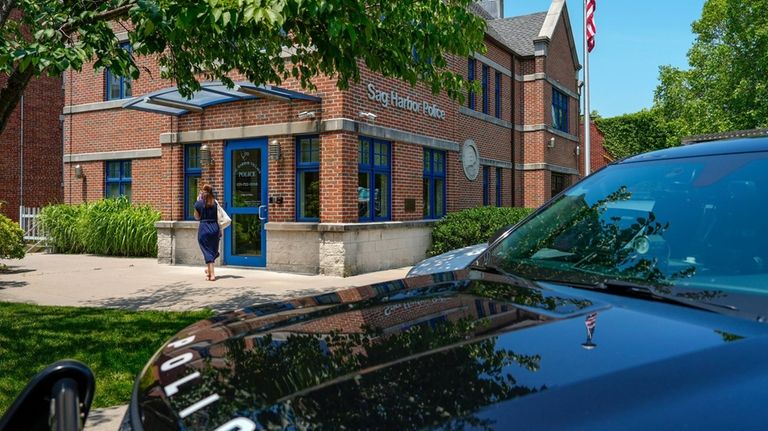 FILE — A squad car is parked outside the Sag...