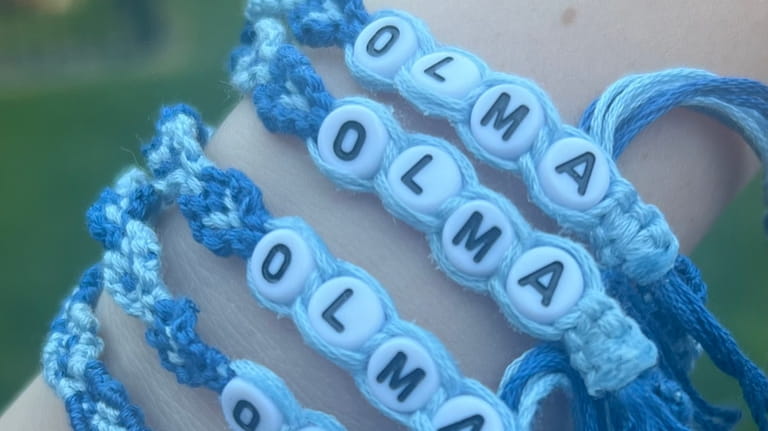 Friendship bracelets that Kaitlyn Dowd, a junior at Our Lady...