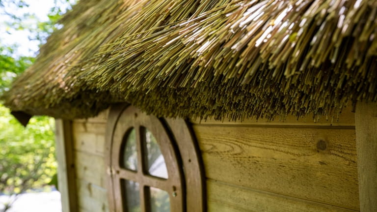 The thatched roof and eyebrow windows are some of the...