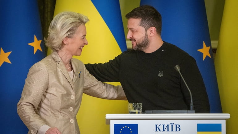 Ukrainian President Volodymyr Zelenskyy, right, and European Commission President Ursula...