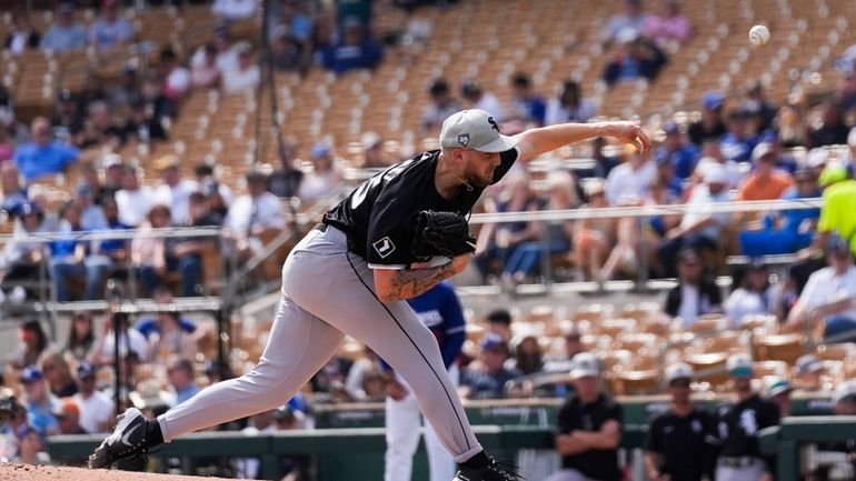 Chicago White Sox starting pitcher Garrett Crochet throws during the...