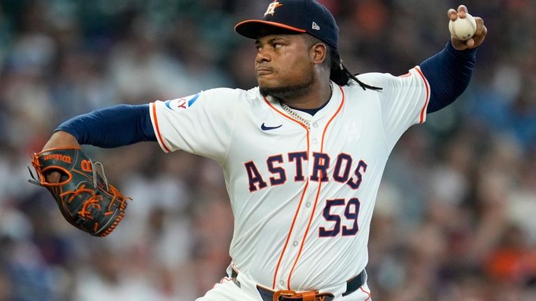 Houston Astros starting pitcher Framber Valdez throws against the Chicago...