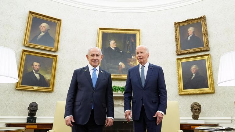 President Joe Biden, right, meets with Israeli Prime Minister Benjamin...