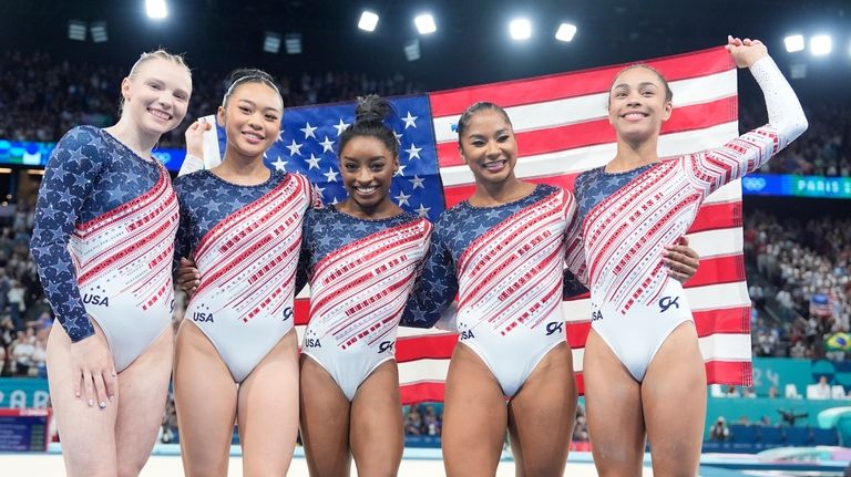 Team USA from left to right, Jade Carey, Suni Lee,...