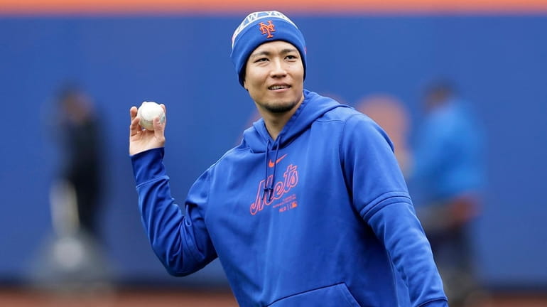 Kodai Senga of the Mets works out on the field at Citi...