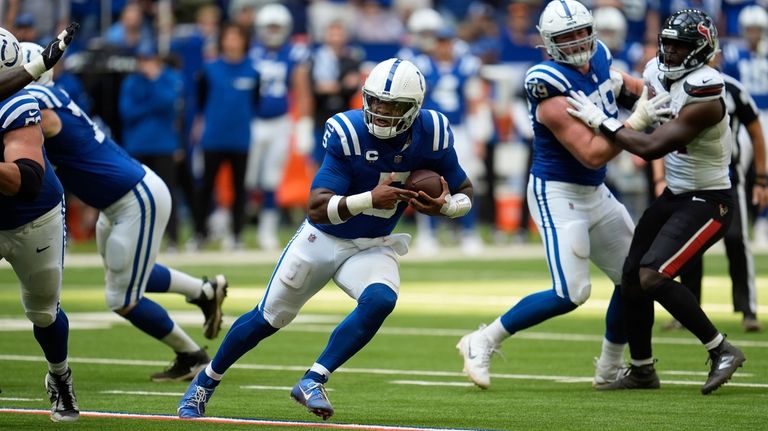 Indianapolis Colts quarterback Anthony Richardson (5) runs during the second...