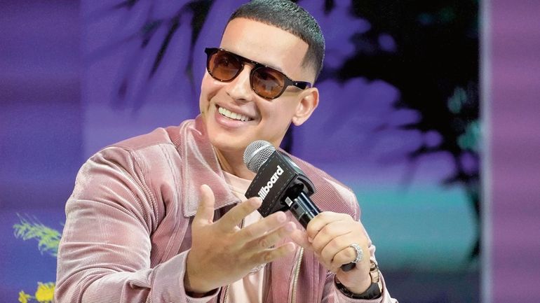 Daddy Yankee celebrates winning the urban genre artist of the year