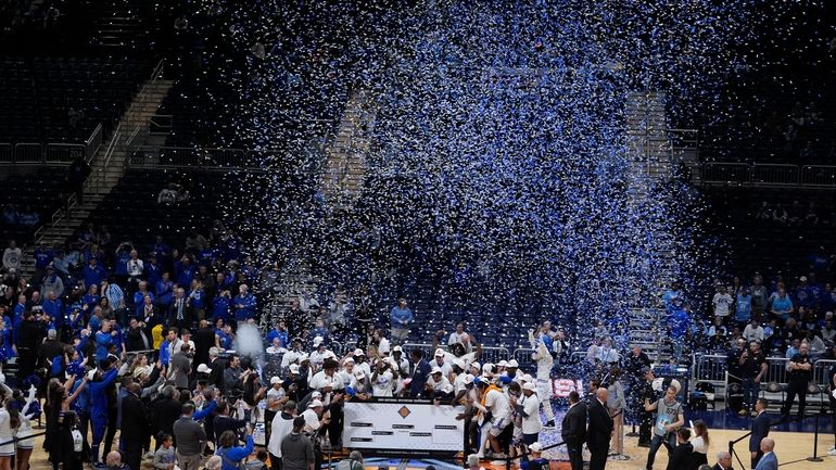 FILE- Seton Hall players celebrate after defeating Indiana State in...