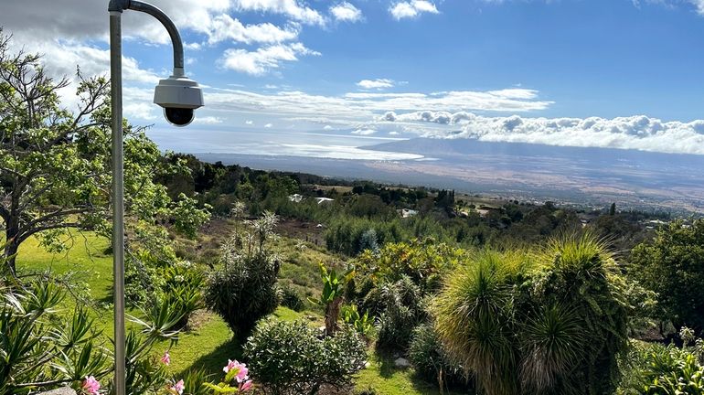 A fire-detection camera overlooks a neighborhood on Thursday, July 18,...