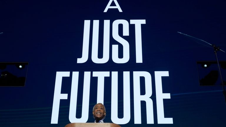 Al Sharpton speaks during the Democratic National Convention Thursday, Aug....