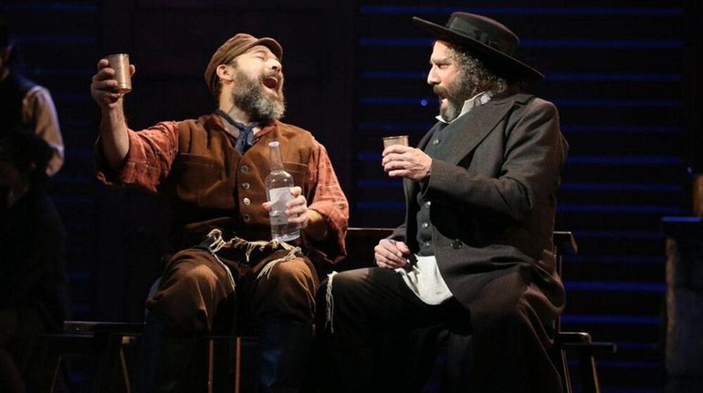 Danny Burstein, left,  as Tevye  in "Fiddler on the Roof."