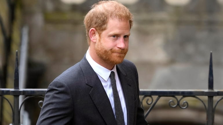 Britain's Prince Harry arrives at the Royal Courts Of Justice...