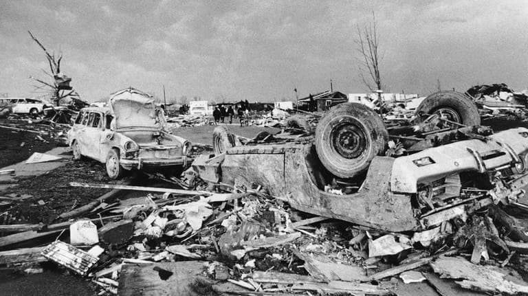 Cars and debris is strewn over Xenia, Ohio after a...
