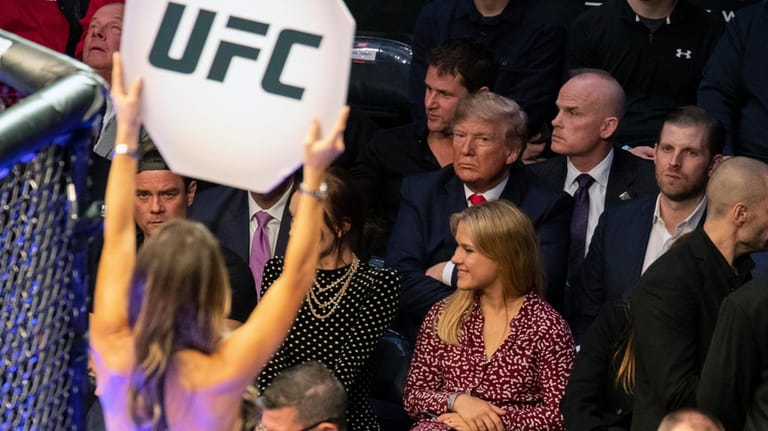President Donald Trump looks on during UFC 244 mixed martial...