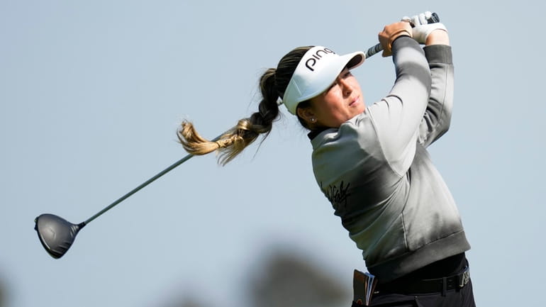 Malia Nam tees off at the ninth hole during the...
