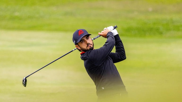 Abraham Ancer hits a shot on the third hole during...