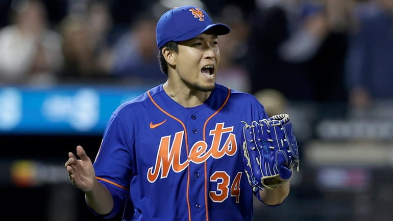 Kodai Senga #34 of the Mets reacts after the seventh inning...