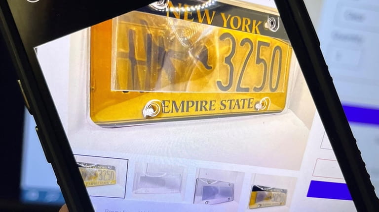 A Newsday illustration showing a license plate camera shield available...