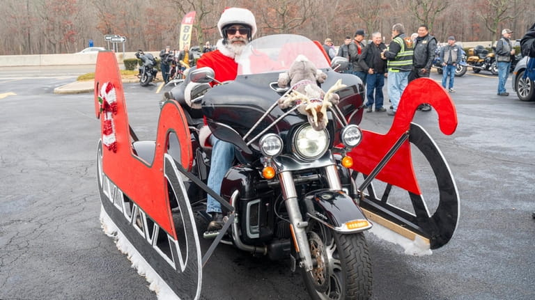 Herb Gilcher of Wantagh on his motorcycle sleigh.