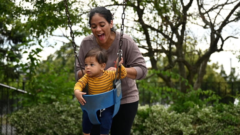 Jacob Hernandez, 11, months, with mom Karina Duran, of East...