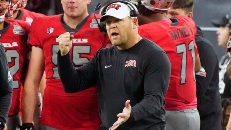 UNLV head coach Barry Odom reacts to his defense during...