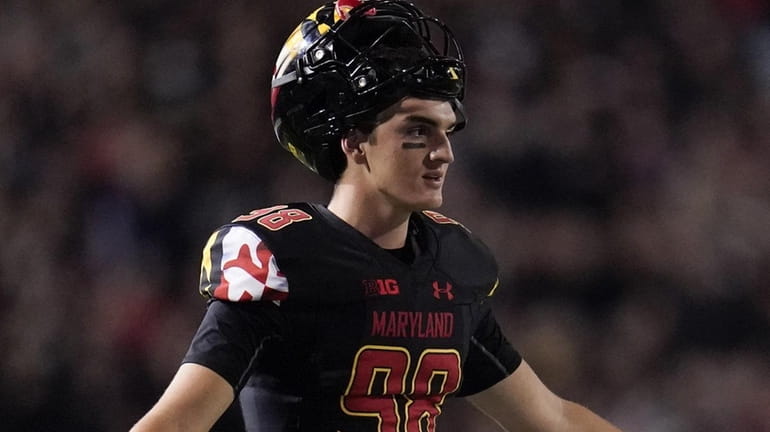 Maryland punter Anthony Pecorella looks on during the first half...