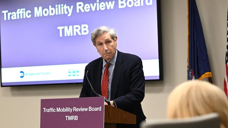Chair of the Traffic Mobility Review Board Carl Weisbrod speaks...